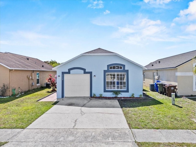 view of front of property with driveway, central air condition unit, a garage, and a front lawn