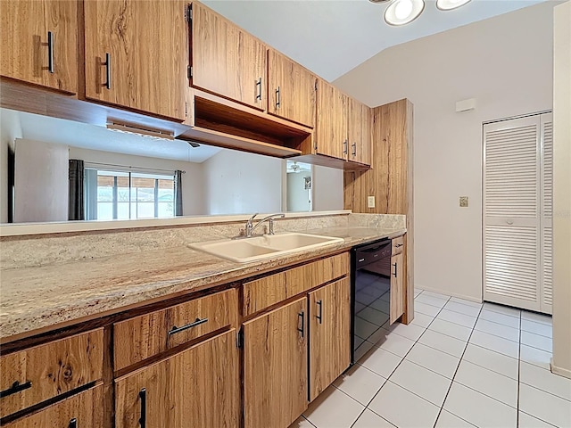 kitchen featuring light tile patterned floors, dishwasher, vaulted ceiling, light countertops, and a sink