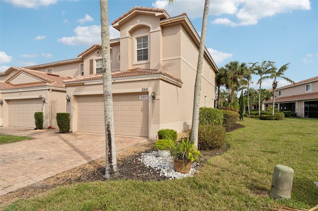 view of property exterior featuring a tile roof, decorative driveway, and stucco siding