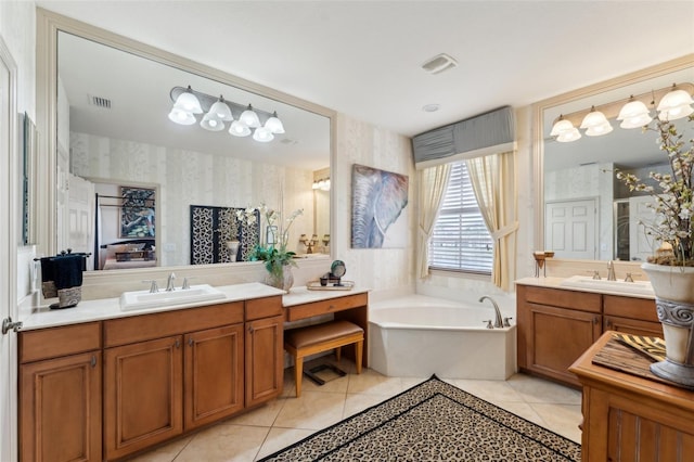 full bathroom featuring wallpapered walls, visible vents, a sink, and tile patterned floors