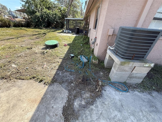 view of yard featuring cooling unit