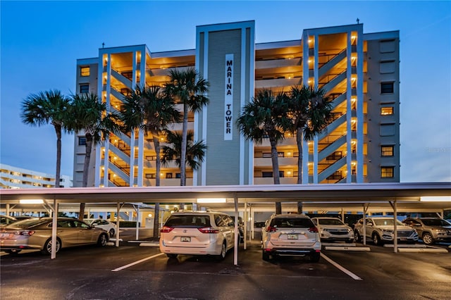 view of property with covered parking