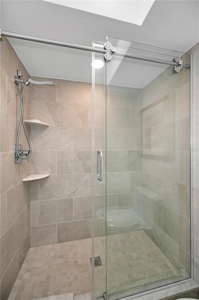 bathroom with a stall shower