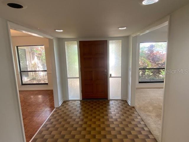 entrance foyer featuring baseboards