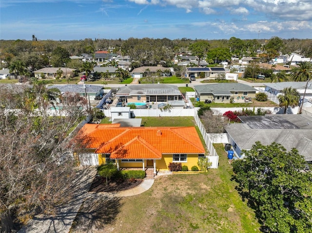 birds eye view of property with a residential view