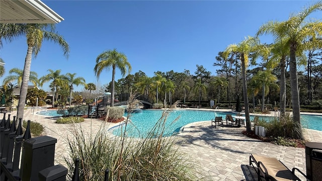 community pool featuring a patio