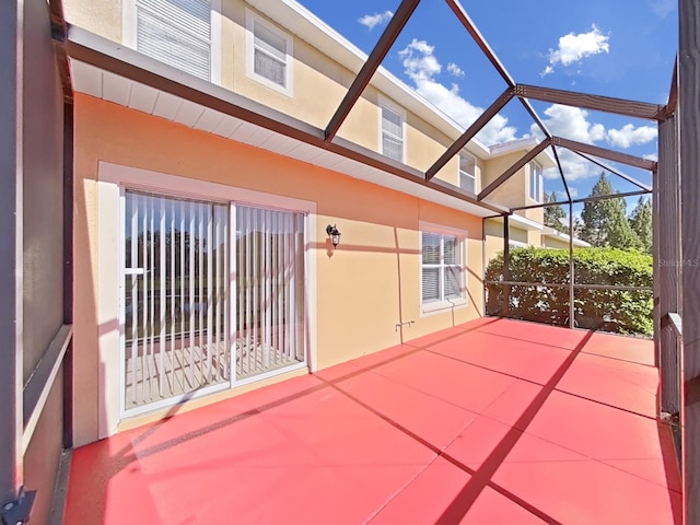 view of patio / terrace with a lanai