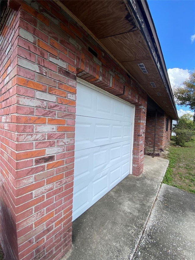 garage featuring driveway