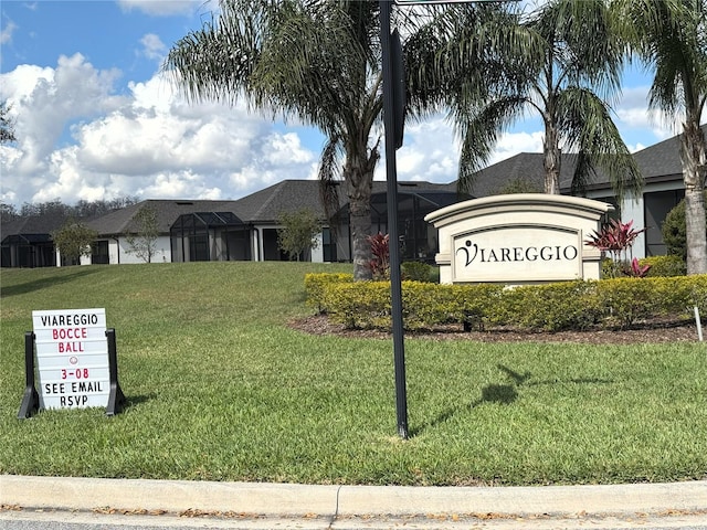 community sign with a yard