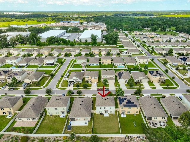 drone / aerial view with a residential view