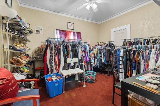 spacious closet with carpet and a ceiling fan