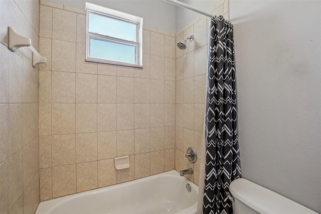 bathroom with toilet and shower / bathtub combination with curtain