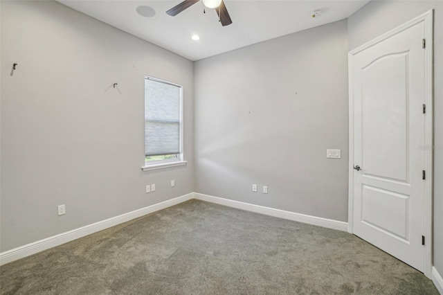 unfurnished room with a ceiling fan, recessed lighting, carpet flooring, and baseboards