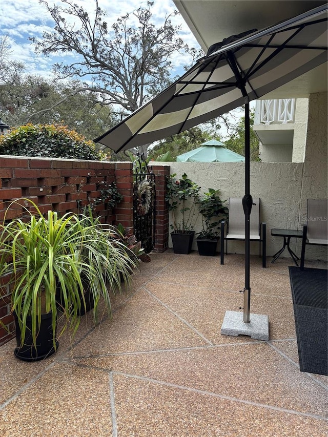 view of patio / terrace with fence