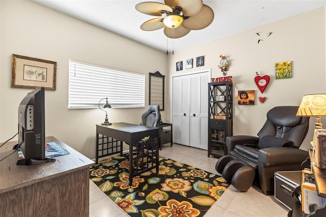 office with light tile patterned floors and a ceiling fan
