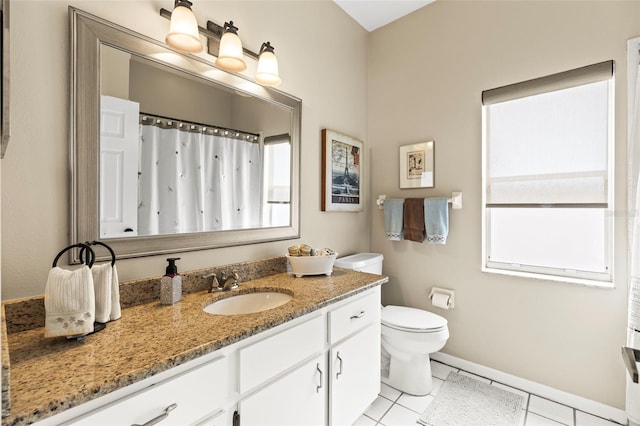 full bath with a shower with shower curtain, vanity, baseboards, tile patterned flooring, and toilet