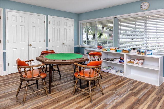 game room with wood finished floors