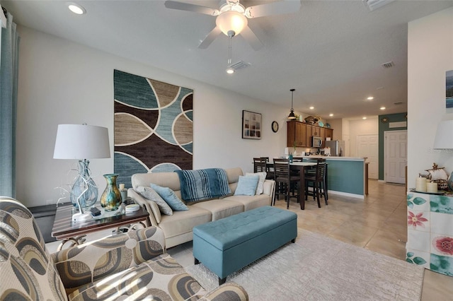 living room featuring recessed lighting, visible vents, ceiling fan, and light tile patterned flooring