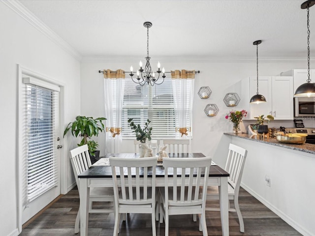 dining room with dark wood-style floors, baseboards, a chandelier, and ornamental molding