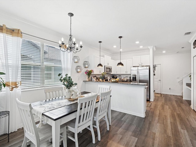 dining room with dark wood finished floors, crown molding, recessed lighting, visible vents, and baseboards