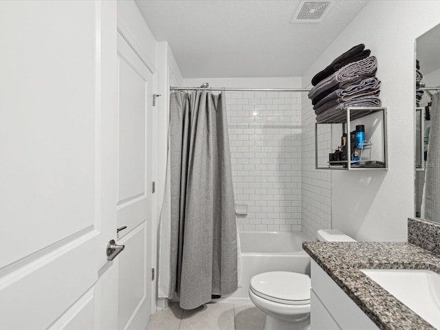 full bath featuring tile patterned flooring, toilet, shower / tub combo, vanity, and visible vents