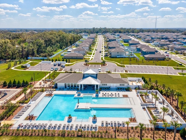 pool featuring fence and a patio