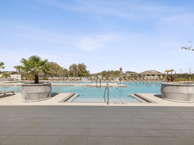 pool featuring a patio area