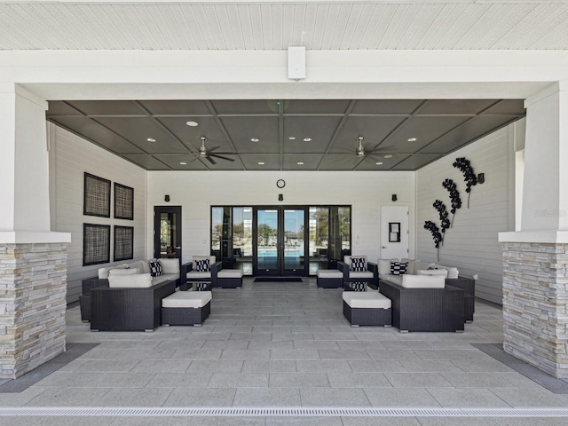 view of patio featuring french doors, ceiling fan, and an outdoor living space