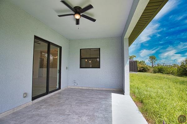 9 Tee View Rd, Rotonda West, FL 33947 - view of patio with a ceiling fan