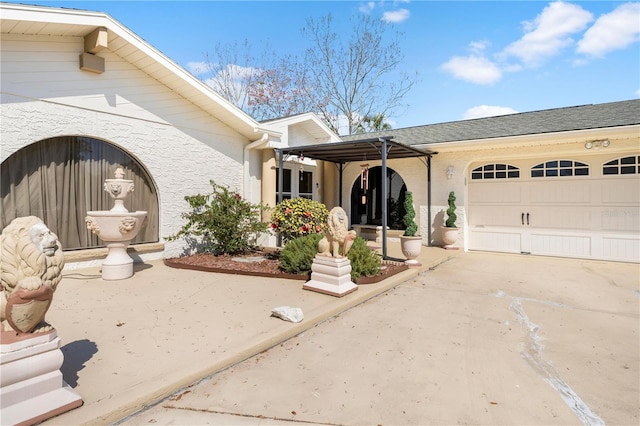 view of front of house featuring driveway and an attached garage