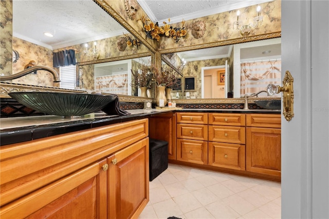 bathroom featuring ornamental molding, a textured ceiling, vanity, and wallpapered walls