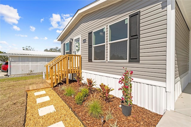 view of home's exterior with a yard