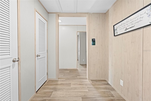 hallway with light wood-type flooring