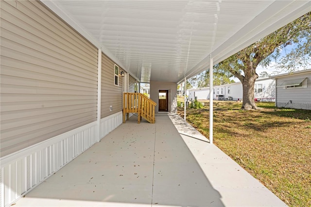 view of patio featuring a carport