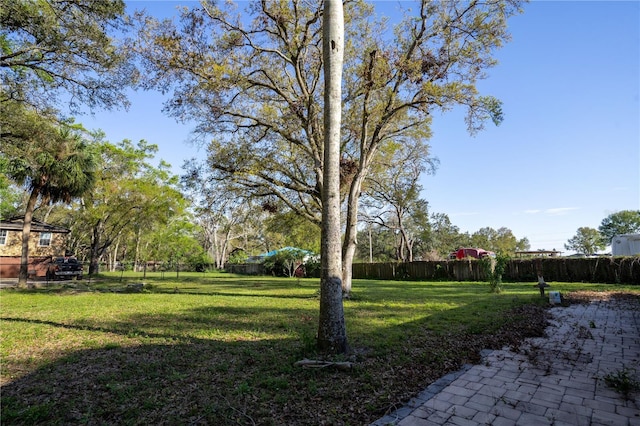 view of yard with fence