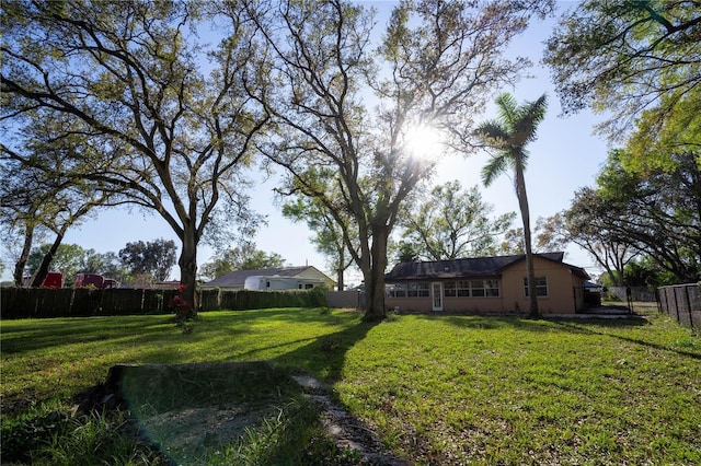 view of yard with fence