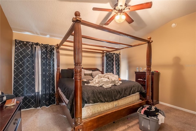 carpeted bedroom featuring a ceiling fan and baseboards