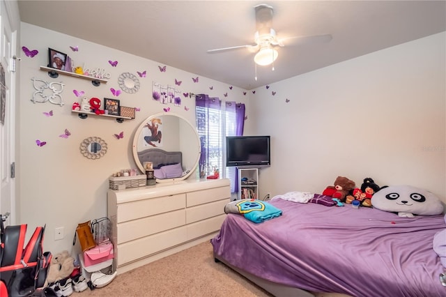 bedroom with light carpet and ceiling fan