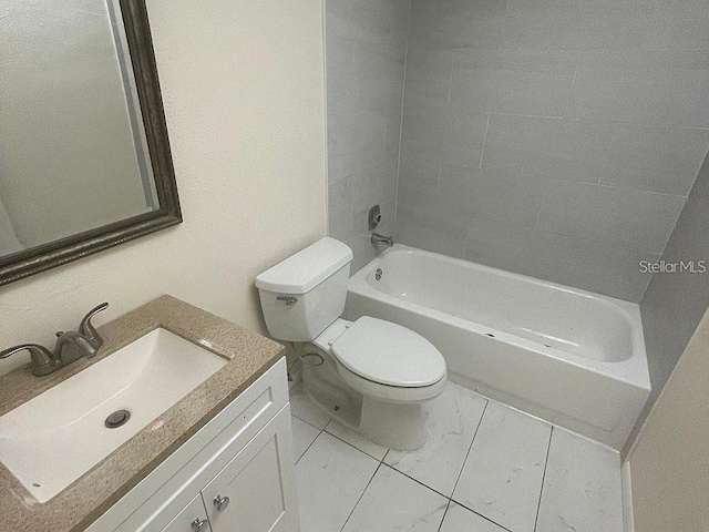 full bathroom featuring toilet, marble finish floor, shower / bathing tub combination, and vanity