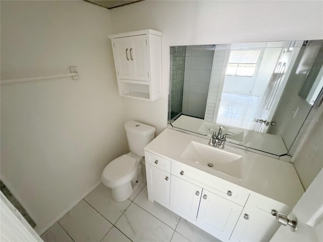 3300 Fox Chase Cir N Unit 229, Palm Harbor, FL 34683 - bathroom with toilet, vanity, baseboards, and tile patterned floors