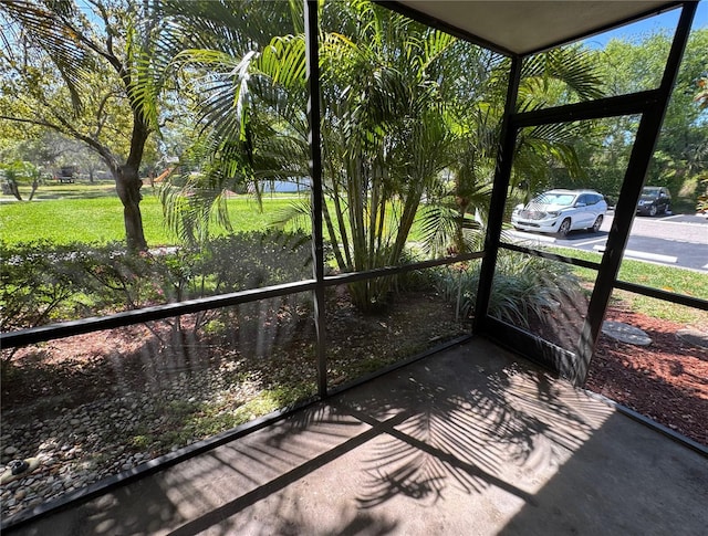 3300 Fox Chase Cir N Unit 229, Palm Harbor, FL 34683 - view of unfurnished sunroom