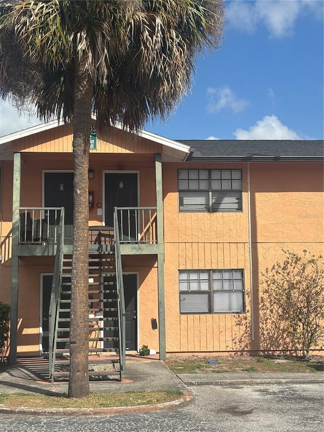 view of building exterior featuring stairway