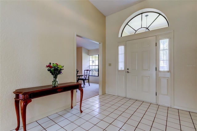 entryway featuring light tile patterned floors