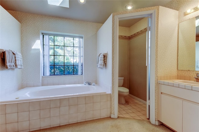 bathroom with a bath, tile patterned flooring, toilet, and wallpapered walls