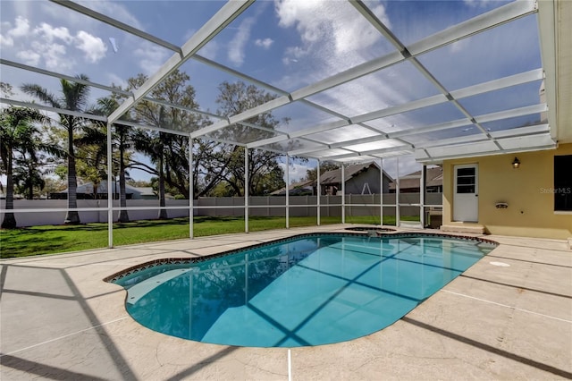 view of swimming pool with a fenced in pool, fence, a lawn, and a patio