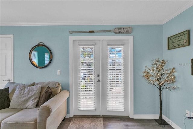 entryway featuring ornamental molding, french doors, wood finished floors, and baseboards