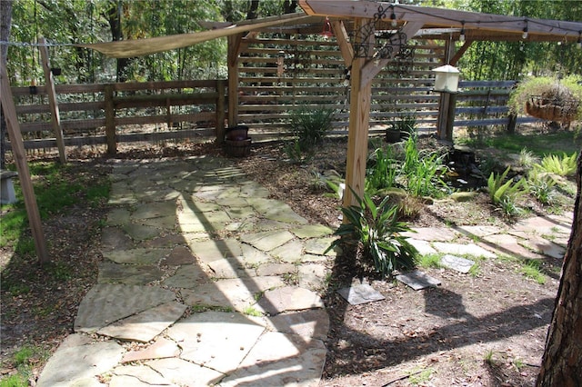 view of patio / terrace with fence