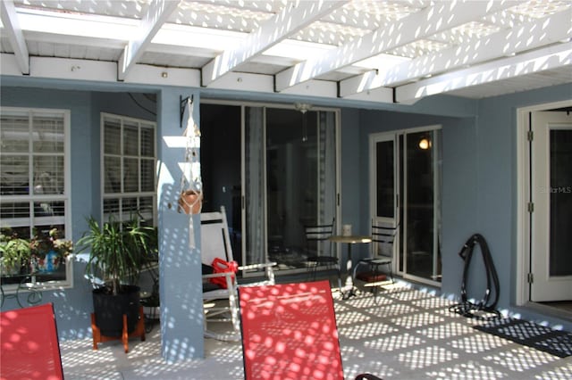 view of patio featuring a pergola