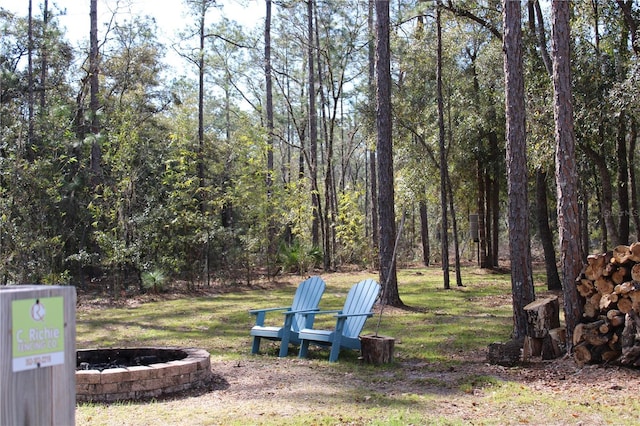 view of yard with a wooded view