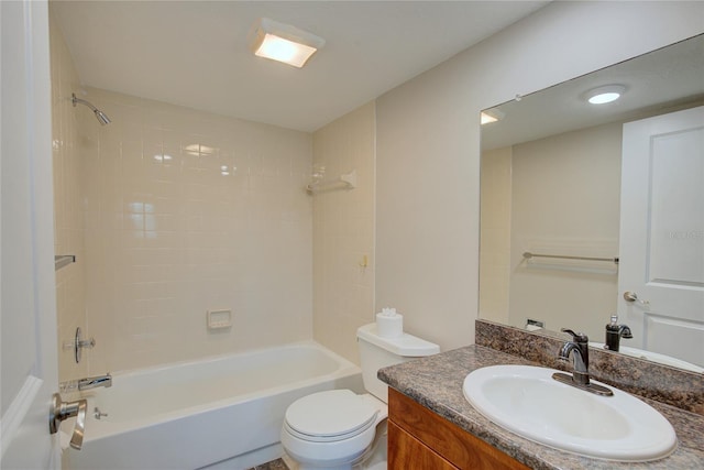 full bath featuring bathtub / shower combination, vanity, and toilet